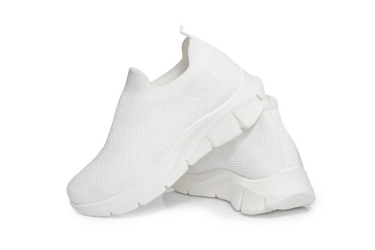 White sport sneakers isolated on white background &ndash; clean athletic footwear