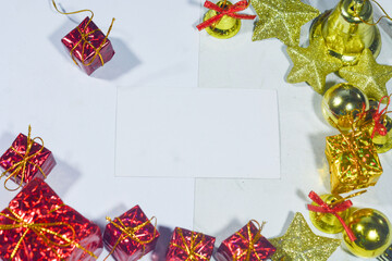 Christmas background with xmas tree and sparkle bokeh lights on red canvas background. Merry...