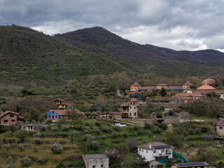 Fototapeta premium Arnedillo's thermal spa and houses nestled in the mountain landscape, la rioja, spain