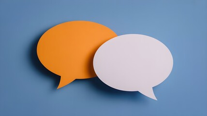 Two Speech Bubbles Highlighting Communication Concepts on a Vibrant Blue Background

