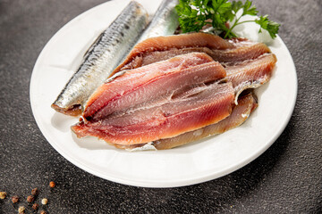 Sardine raw fish fillet seafood anchovy filet fresh delicious gourmet food background on the table rustic food top view copy space pescetarian diet