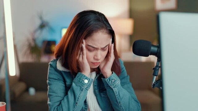 Headache, eye strain and podcast with woman in home for editing deadline, fatigue and overworked. Vision, content creation burnout and migraine with person in studio for streamer, glasses and stress