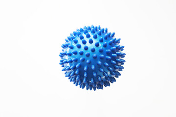 Close-up of a Blue Spiky Massage Ball on White Background for Physical Therapy and Fitness