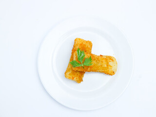 Two pieces of crispy risol mayo served on a clean white plate, isolated on a white background. Ideal for food advertising, menu design, or culinary content