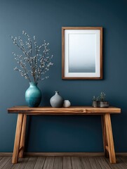 Wooden console table with framed artwork and vase