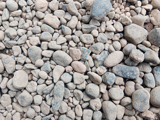Abstract nature background with round gray pebbles