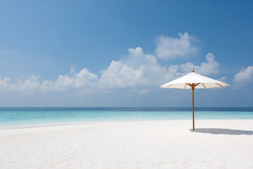 solitary umbrella standing on pristine beach surrounded by soft white sand and clear turquoise waters