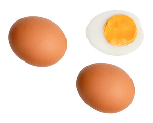 Top view set of raw brown chicken eggs and cooked or boiled chicken egg with egg yolk in half isolated on white background with clipping path