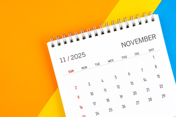November 2025 month desk calendar on colorful.
