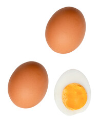 Top view set of raw brown chicken eggs and cooked or boiled chicken egg with egg yolk in half isolated on white background with clipping path