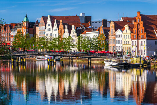 Historic skyline along the Trave river in the old town of Lubeck, Germany on a summer day