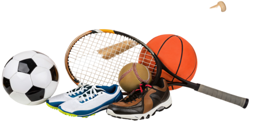 A still life of various sports equipment including balls shoes and a tennis racket on black background