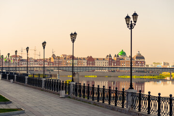Beautiful cast iron fence on the Bruges embankment in Yoshkar-Ola