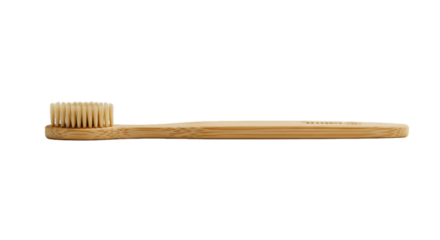 A natural bamboo toothbrush, ready for use, isolated with a clean, black background.