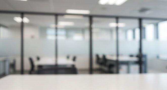 Fototapeta Bright, minimalist office blur with soft natural light. Clean backdrop for product mockups & digital overlays.