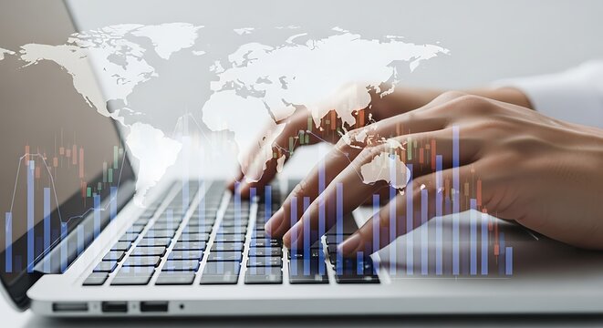 Hands typing on laptop with financial charts and world map representing global business