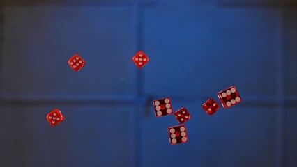 Floating Red Dice Below the Glass Table