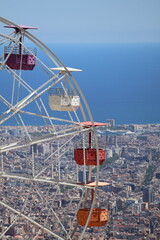 Ferris wheel and the city Barcelona