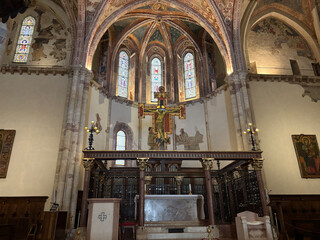 The main altar in the interior of the church Basilica of Saint Clare ("Basilica di Santa Chiara"), Assisi, Italy.