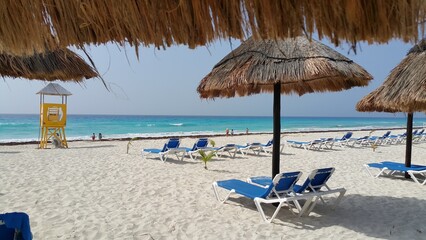lounge chairs on the beach