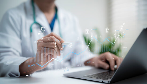 Doctor Using Digital laptop for Healthcare Data Visualization