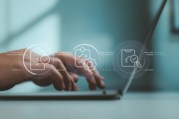 Digital document review and approval interface floating above typing hands on modern laptop.
