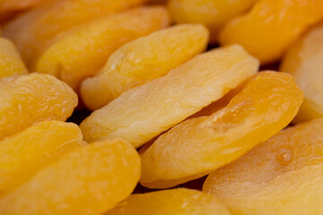 dried pitted apricots are yellow in color, a lot of dried apricots are dehydrated after removing the seeds