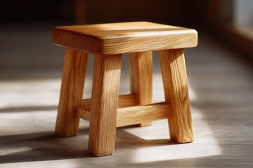 Simple wooden stool on a light floor.
