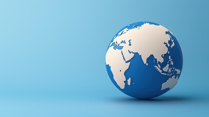 Naklejka premium economy trade demand concept. A globe model against a blue background representing global geography and travel.