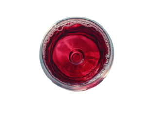 A glass of red wine is sitting on a white background