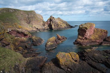 Fototapeta premium Eroded cliffs along St Abbs Head, Berwickshire, Scotland