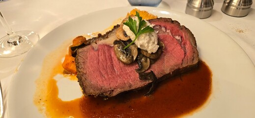 beef steak with vegetables on a plate