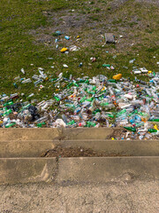 A substantial amount of plastic waste is strewn across the shoreline in Batumi, Georgia. The litter disrupts the natural beauty of the coastal landscape, highlighting environmental concerns.
