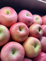Pink Red Fuji Apples in Grocery Display