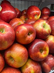 Shiny Red Apples in Grocery Display