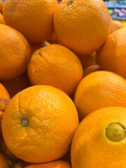 Fresh Oranges Displayed in Grocery Market