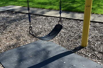 Empty Swing on a Playground Swing Set at the Park, Burlington, Wisconsin