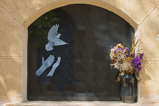 flores lapida cementerio