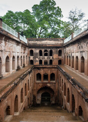 Obraz premium Ancient Stepwell with Arched Galleries