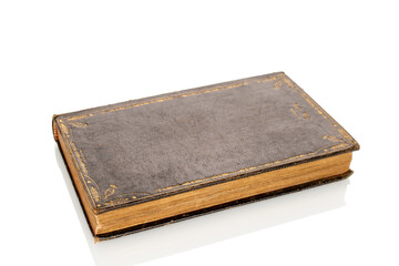 One old rare book isolated on white background, close-up.