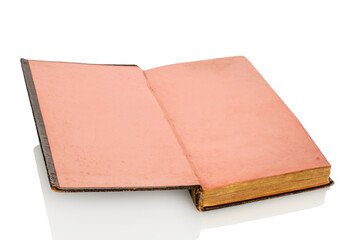 One old rare book isolated on white background, close-up.