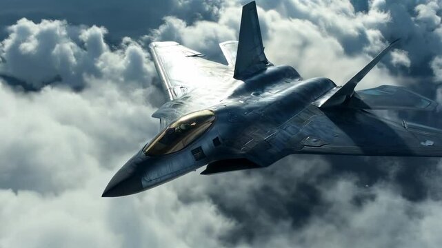 An F-22 Raptor military jet soars through the sky above the clouds, in a beautiful composition.