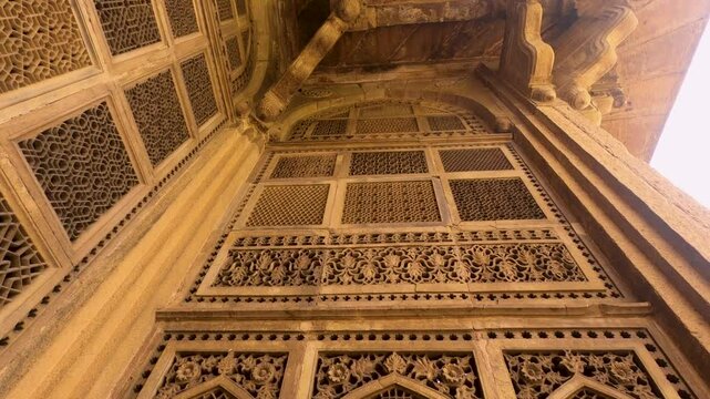 Closeup details of The Tomb of Tansen and Mohammad Ghaus is of typical Mughal architectural style in Gwalior, a Sufi saint in Gwalior, Madhya Pradesh, India
