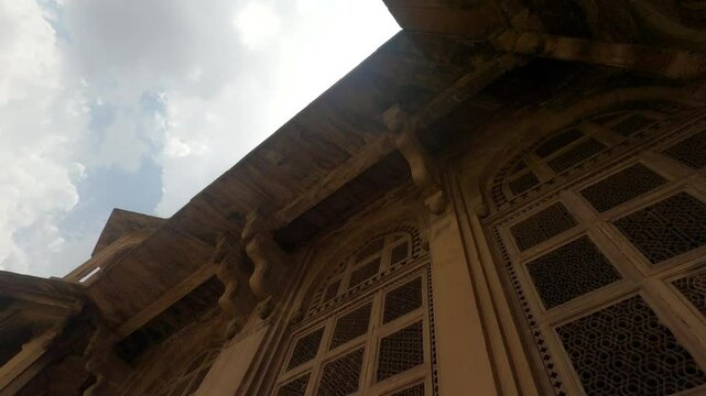 Closeup details of The Tomb of Tansen and Mohammad Ghaus is of typical Mughal architectural style in Gwalior, a Sufi saint in Gwalior, Madhya Pradesh, India