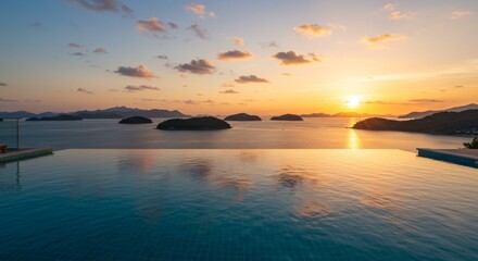 Obraz premium Infinity Pool Sunset Over Island Paradise 2025-05-19 - Tranquil sunset view from an infinity pool overlooking a serene island seascape. Symbolizing peace, luxury, escape, relaxation, and paradise