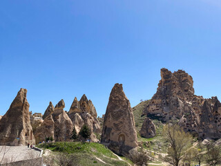 Uchisar Castle or Kalesi, a unique cave building, carved from volcanic rock at the highest point of Cappadocia, Turkiye