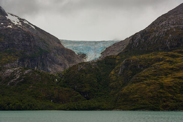 sailing through the mountainous region of the national park Alberto de Agostini, Tierra del Fuego, Chile