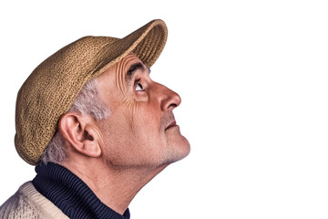 Senior person looking upward, wearing cap, cut out transparent