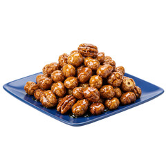 Fototapeta premium A vibrant plate of caramel-coated nuts stacked high, set against a clean backdrop