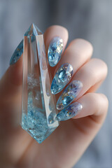 Gleaming crystals and dazzling nails showcase creativity and artistry in a serene setting